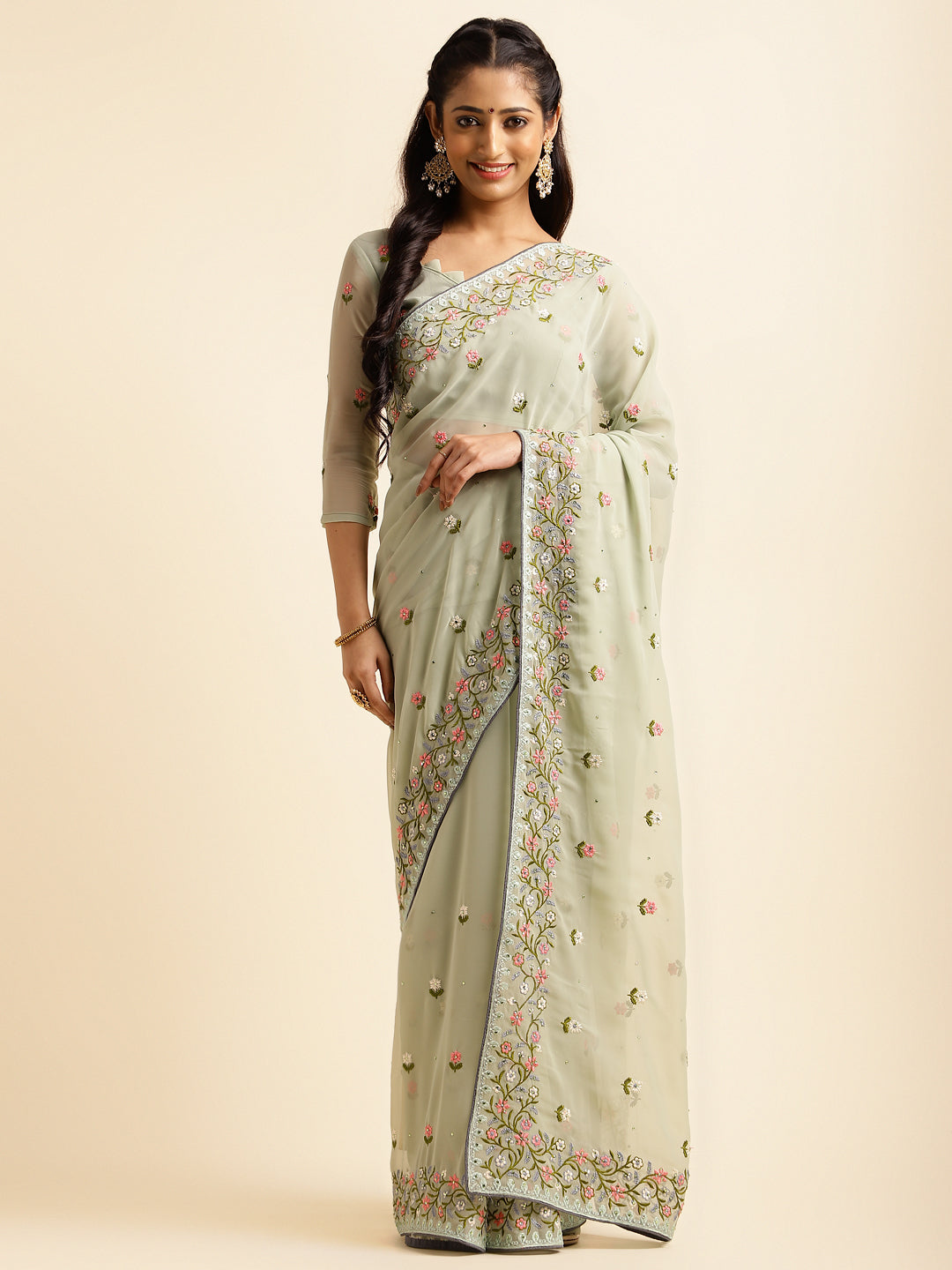 Model wearing georgette embroidery work saree