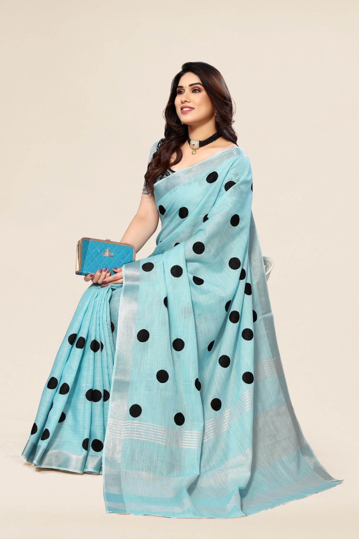 Blue linen saree with embroidered polka dots