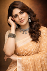 Orange linen saree with floral design