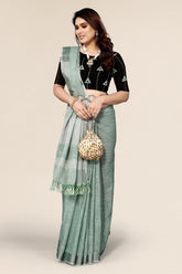 Plain green linen saree with designer blouse