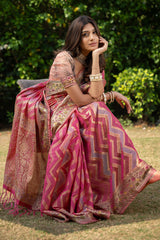Model wearing beautiful organza pink saree