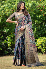 Model wearing organza leheriya zari woven saree
