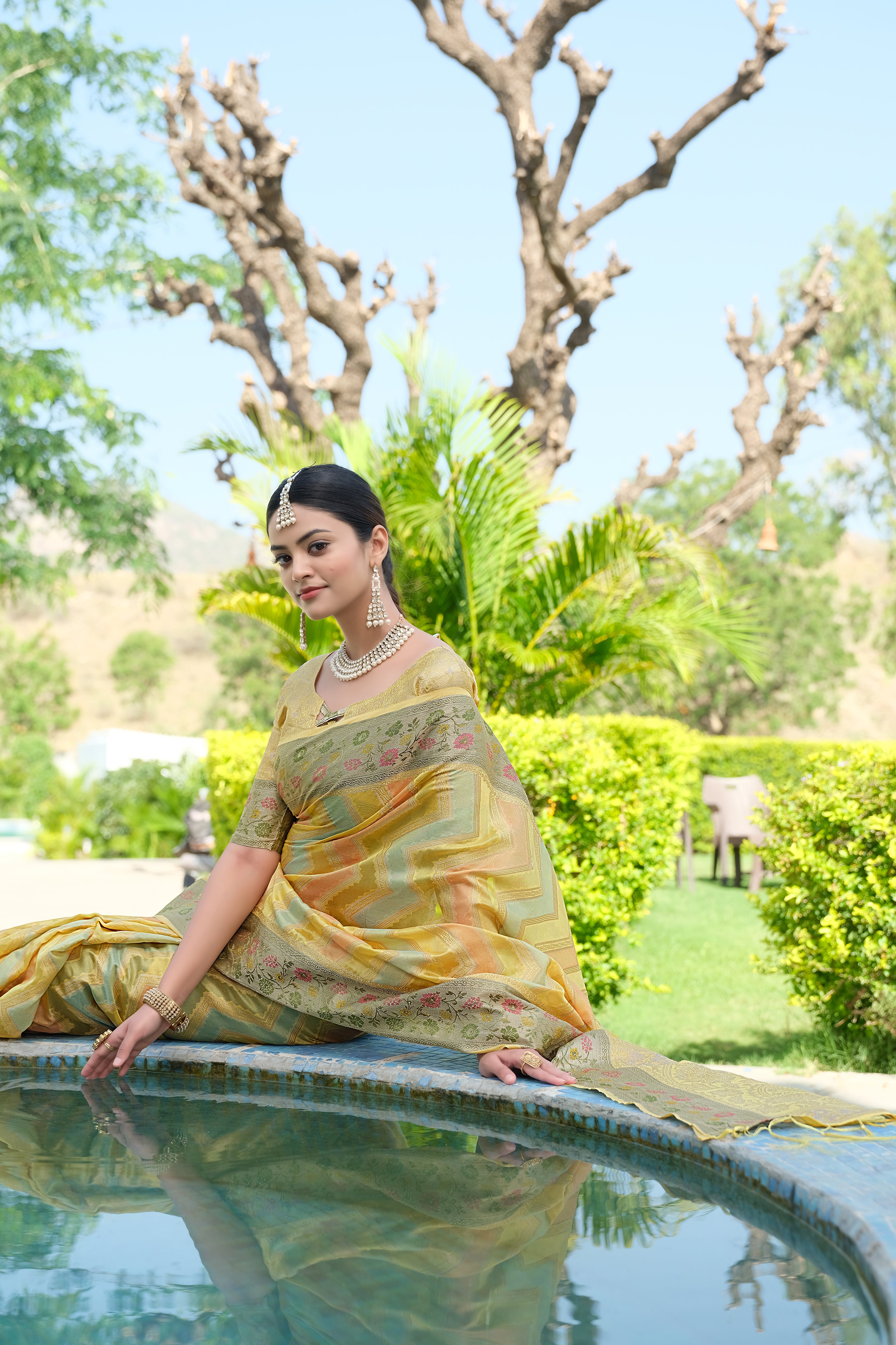 Yellow organza Leheriya designer saree