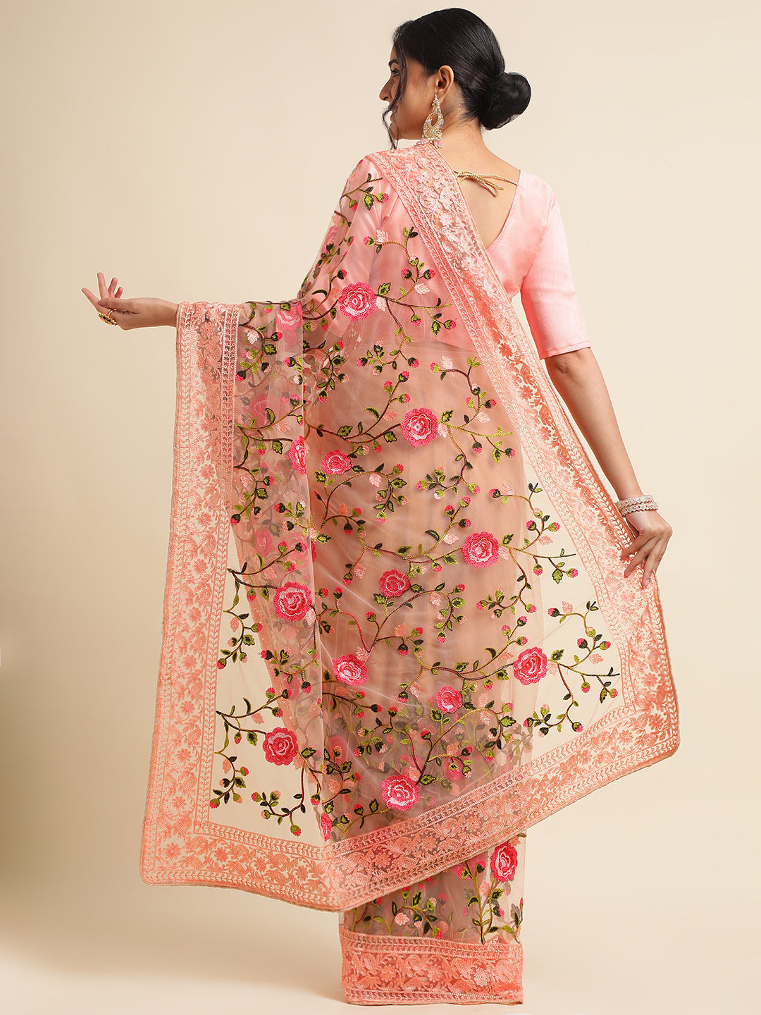 Back view of orange net saree