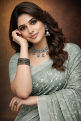 Teal Green linen saree with floral design
