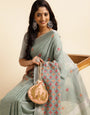 Teal Green Linen Embroidery Saree