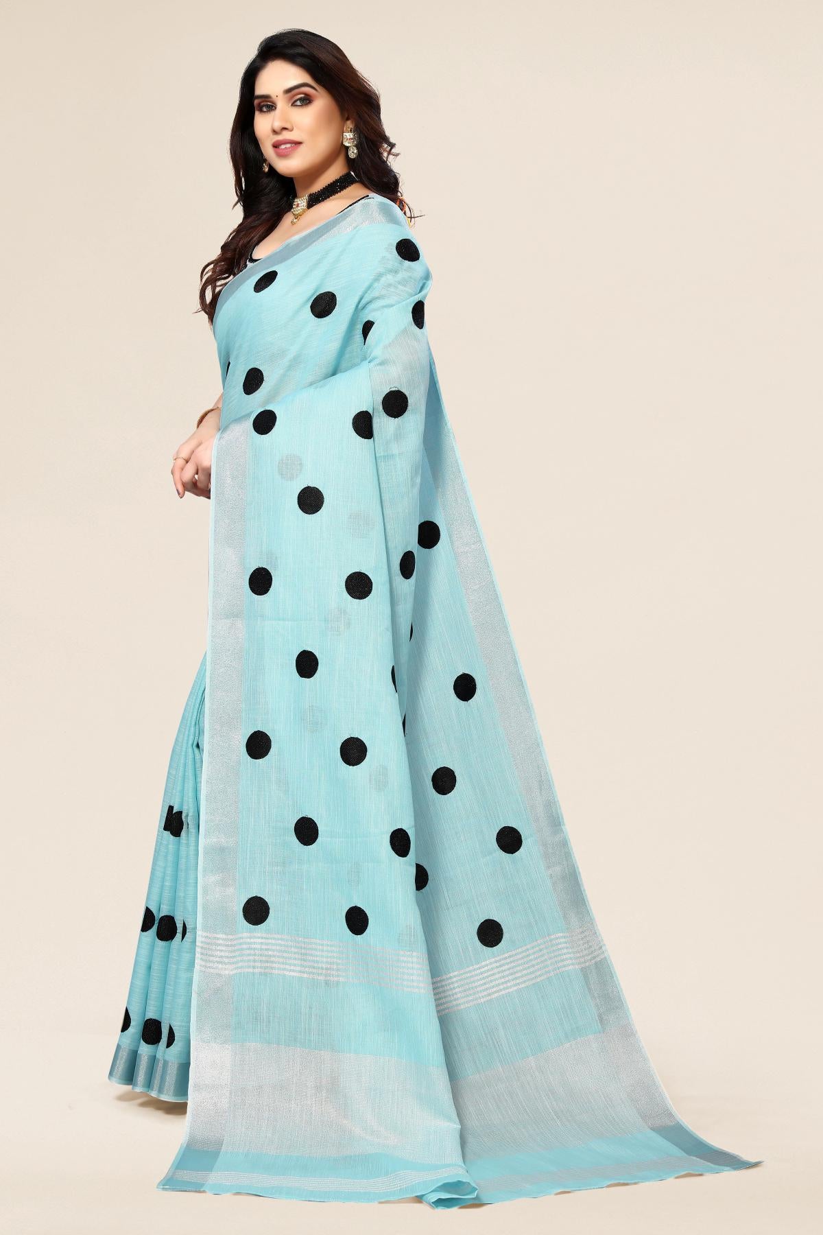 Blue linen saree with embroidered polka design