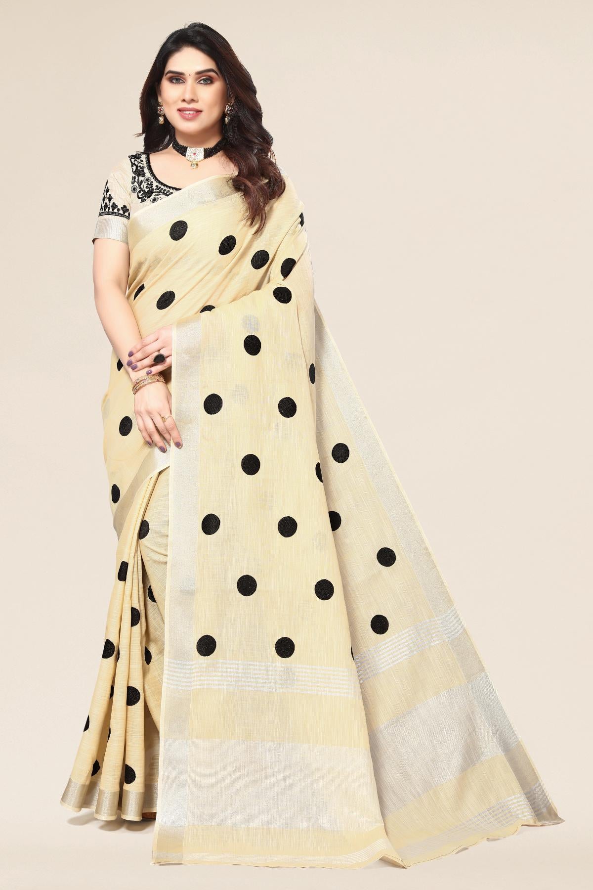 Cream linen saree with embroidered polka design