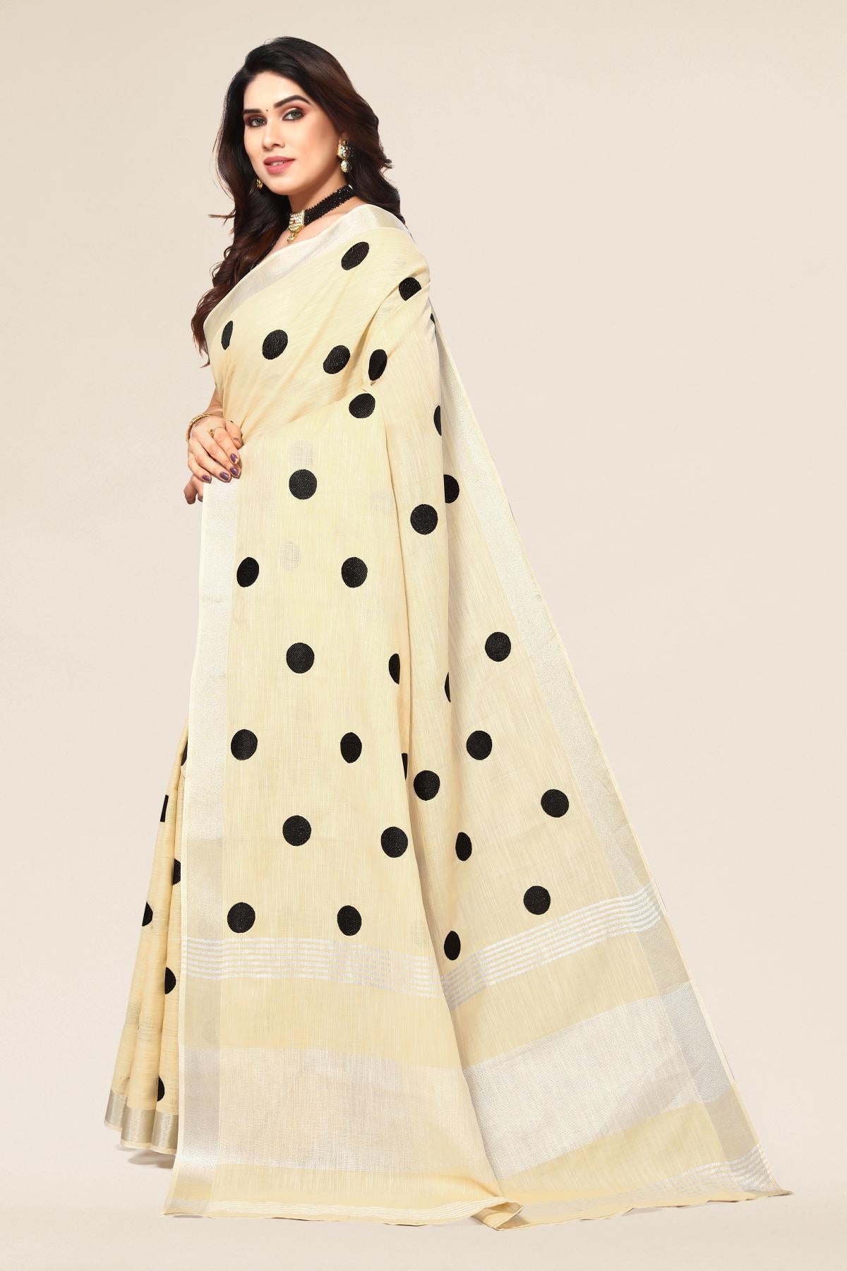 Cream linen saree with embroidered polka design