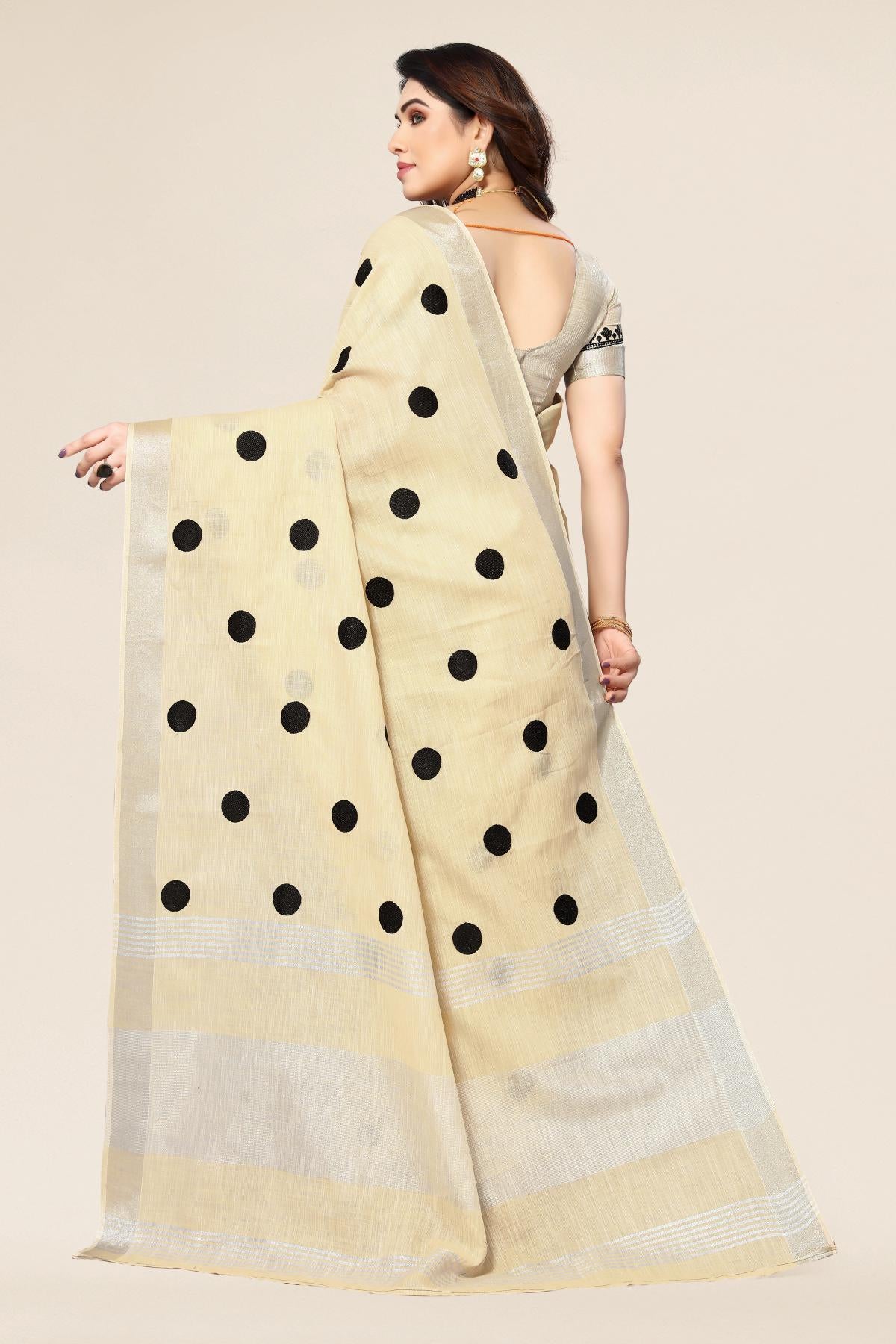 Cream linen saree with embroidered polka design