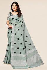 Rama linen saree with embroidered polka design