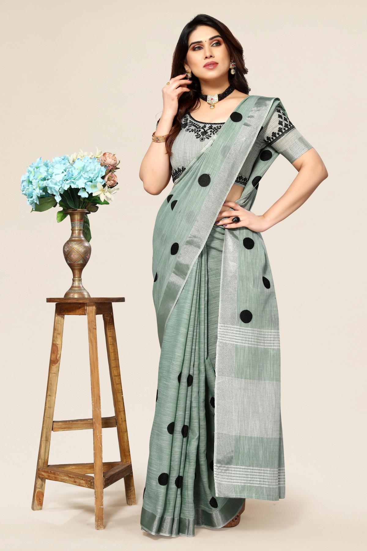 Rama linen saree with embroidered polka design