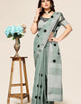 Rama linen saree with embroidered polka design