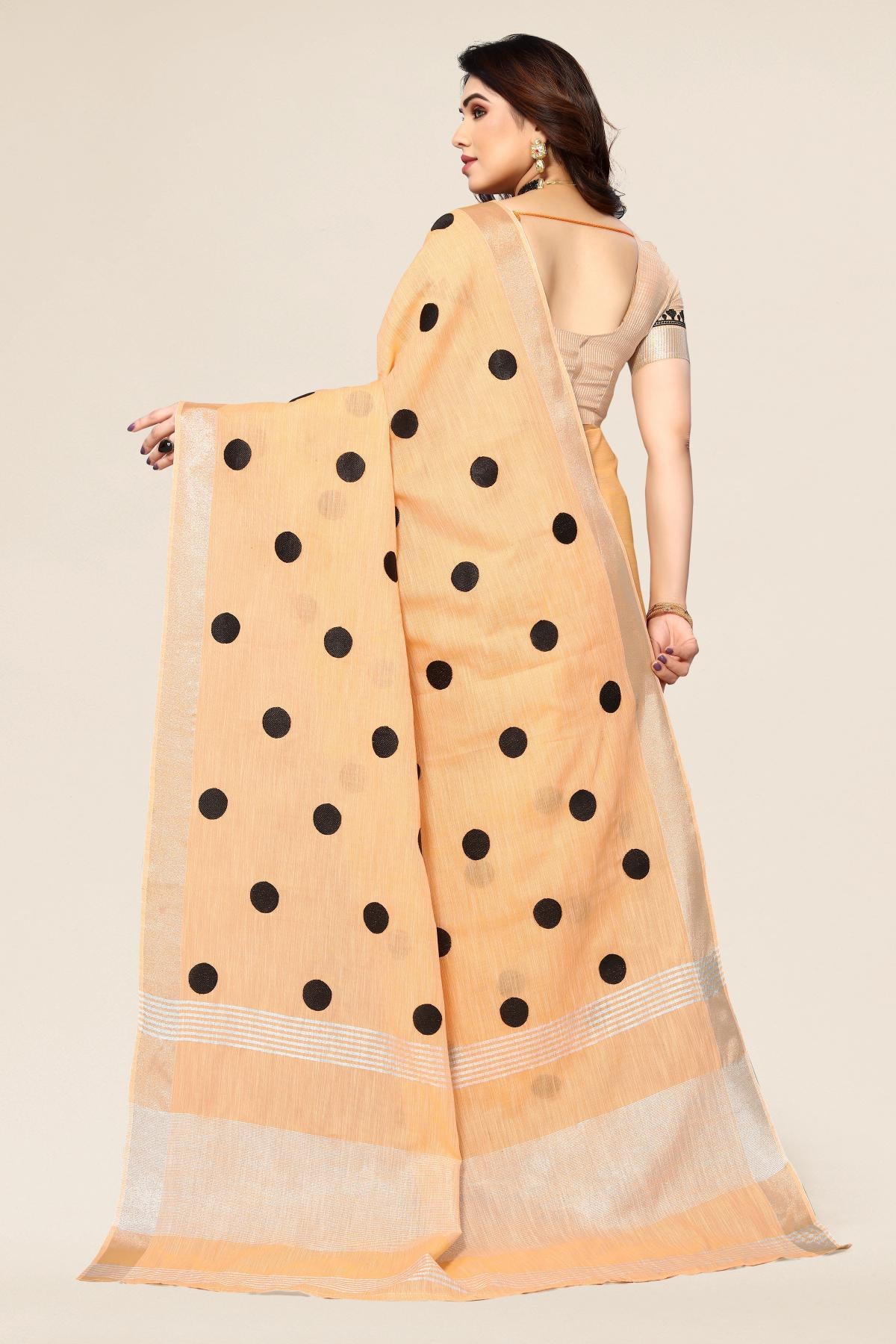 Orange linen saree with embroidered polka design