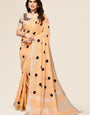 Orange linen saree with embroidered polka design