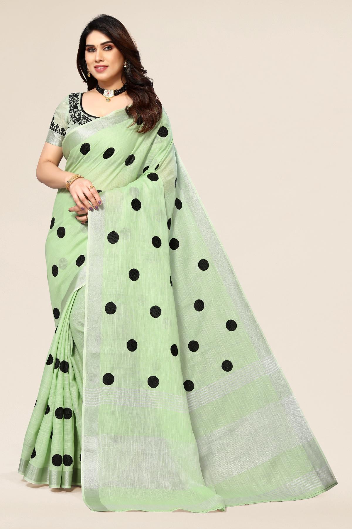 Green linen saree with embroidered polka design