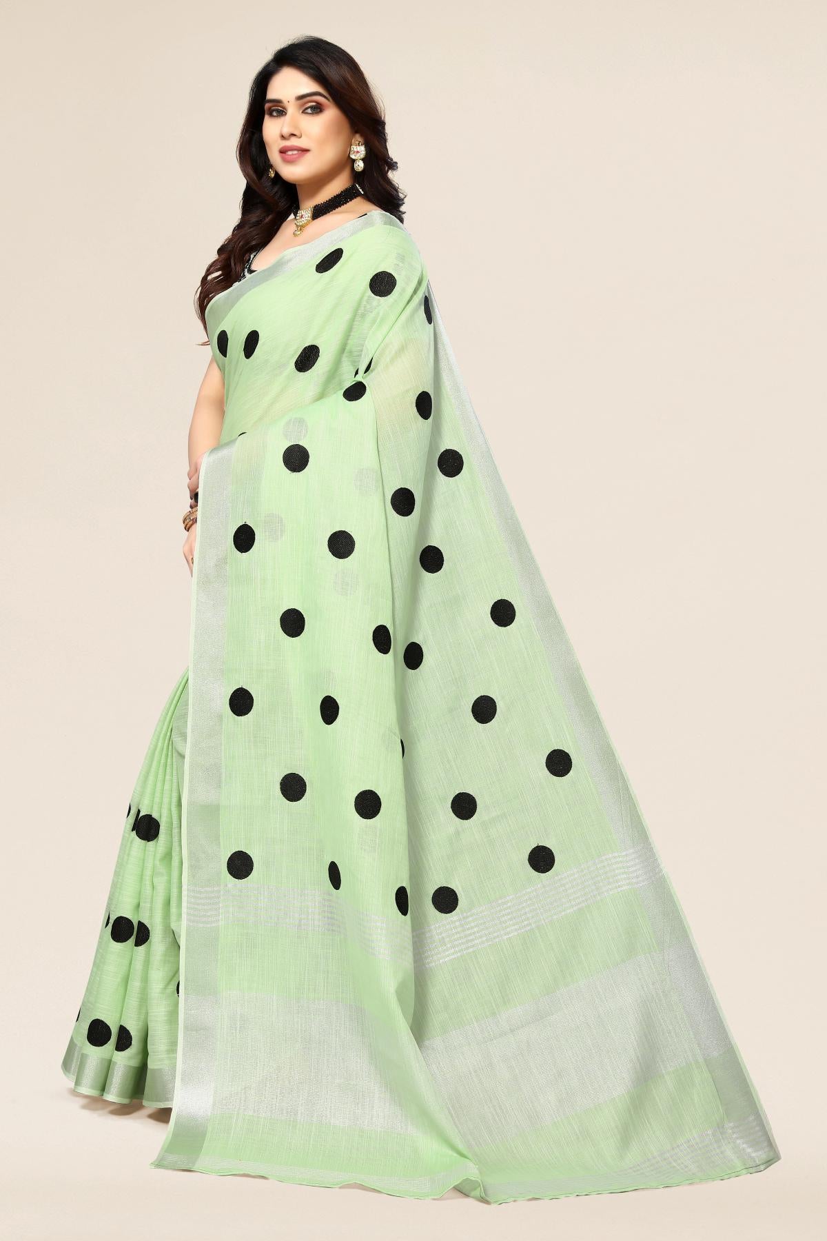 Green linen saree with embroidered polka design