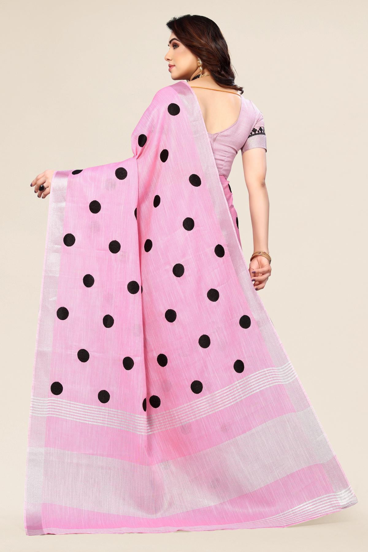 Pink linen saree with embroidered polka design