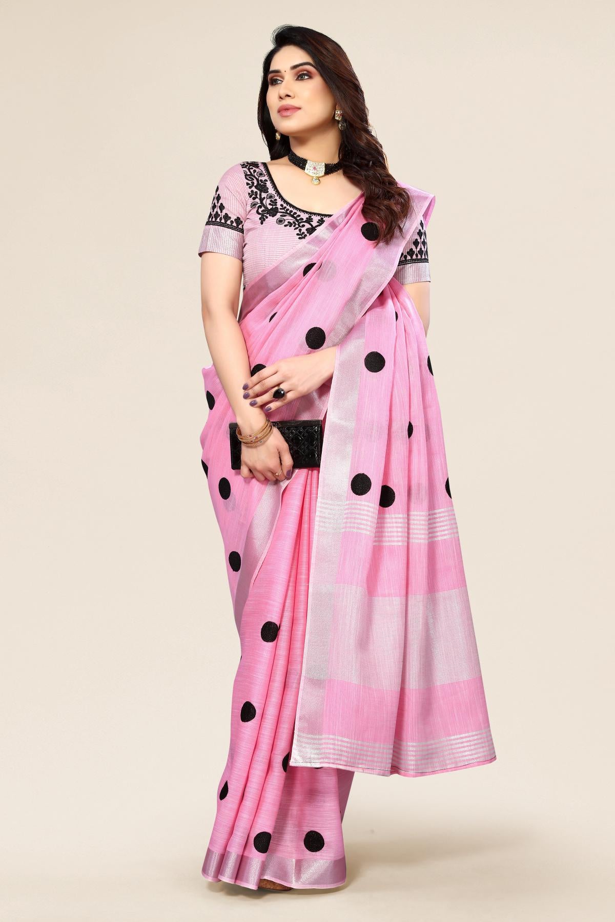 Pink linen saree with embroidered polka design