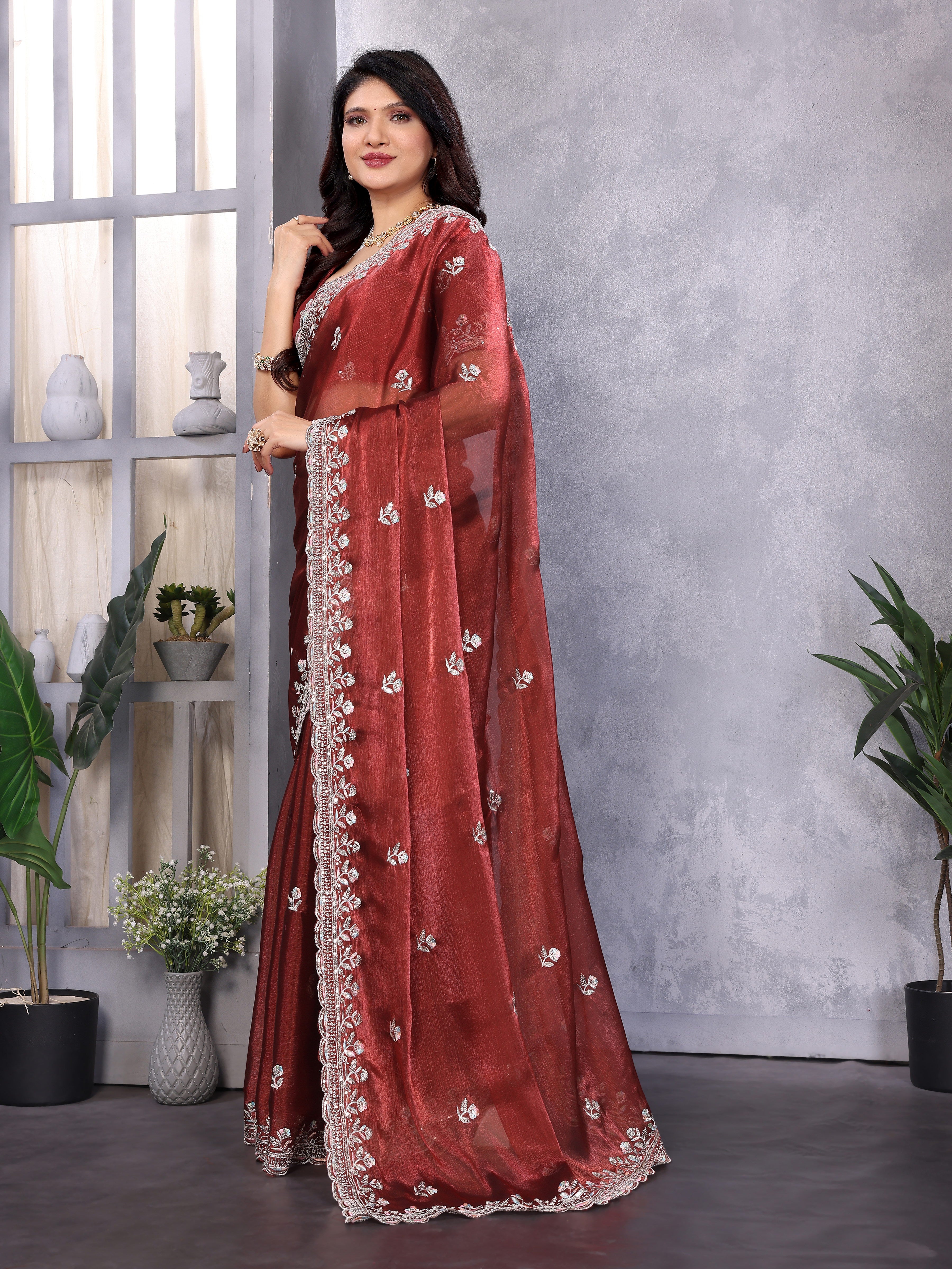 Brown silk saree with cut work border and buttis