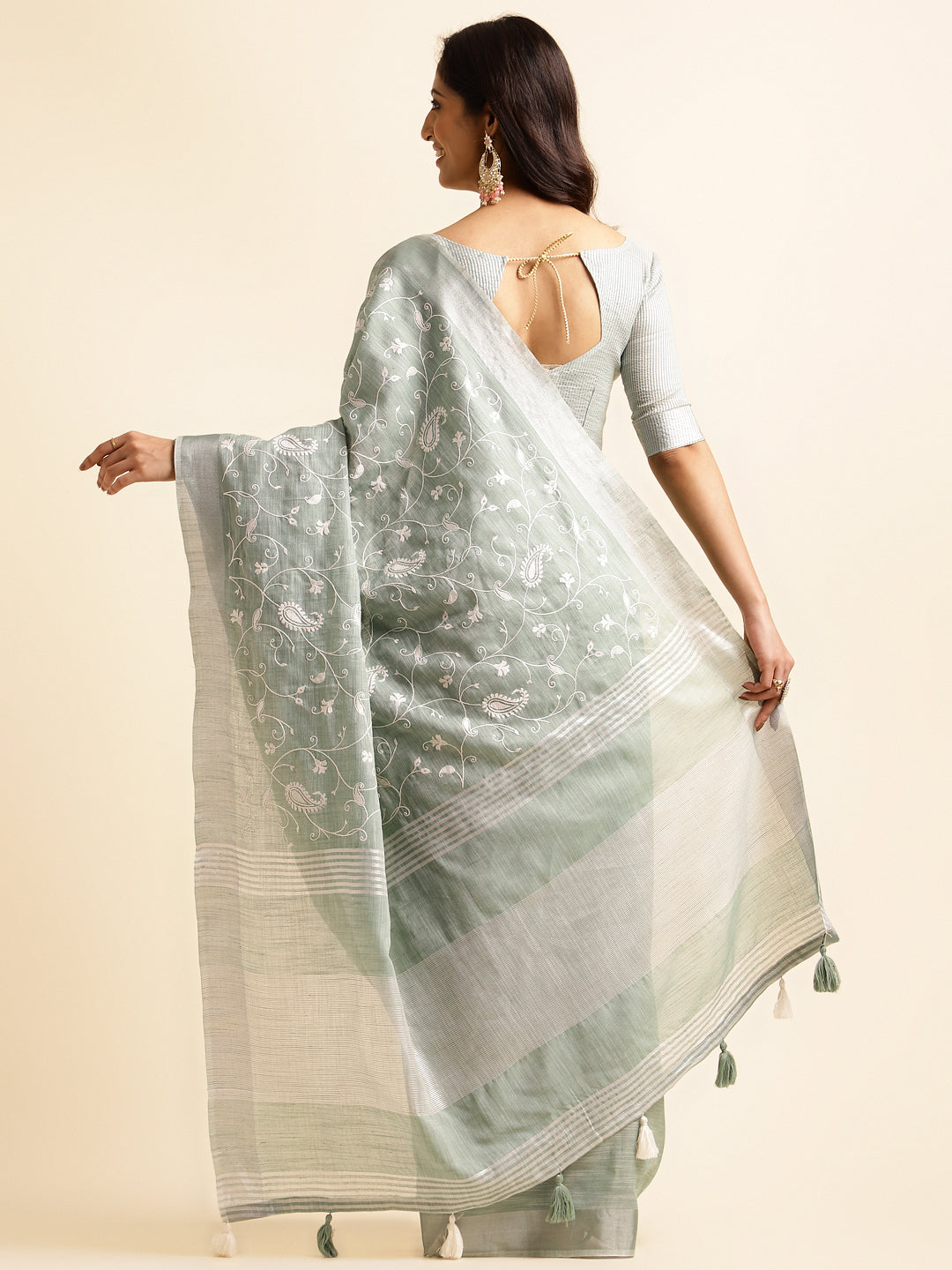 Green linen saree with floral design