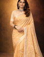 Orange linen saree with floral design