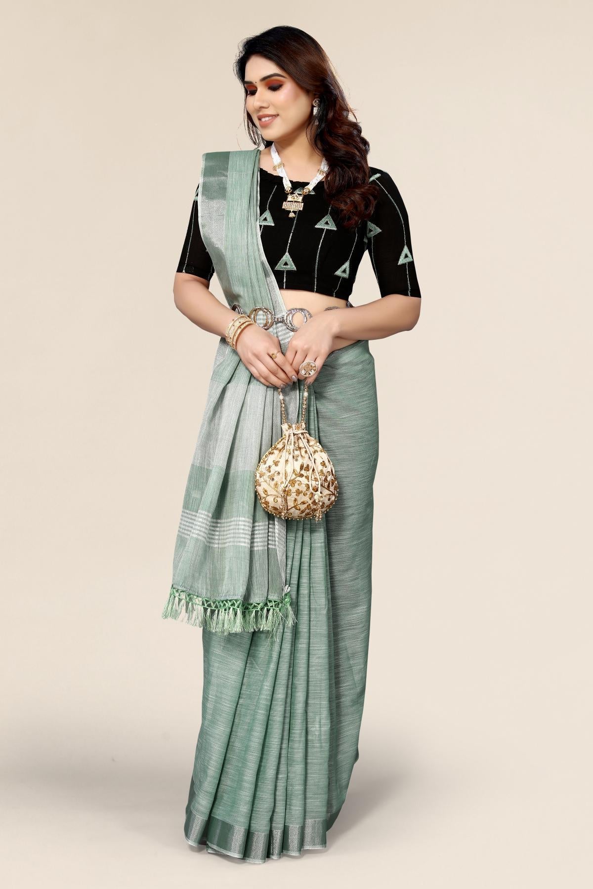 Plain green linen saree with designer blouse