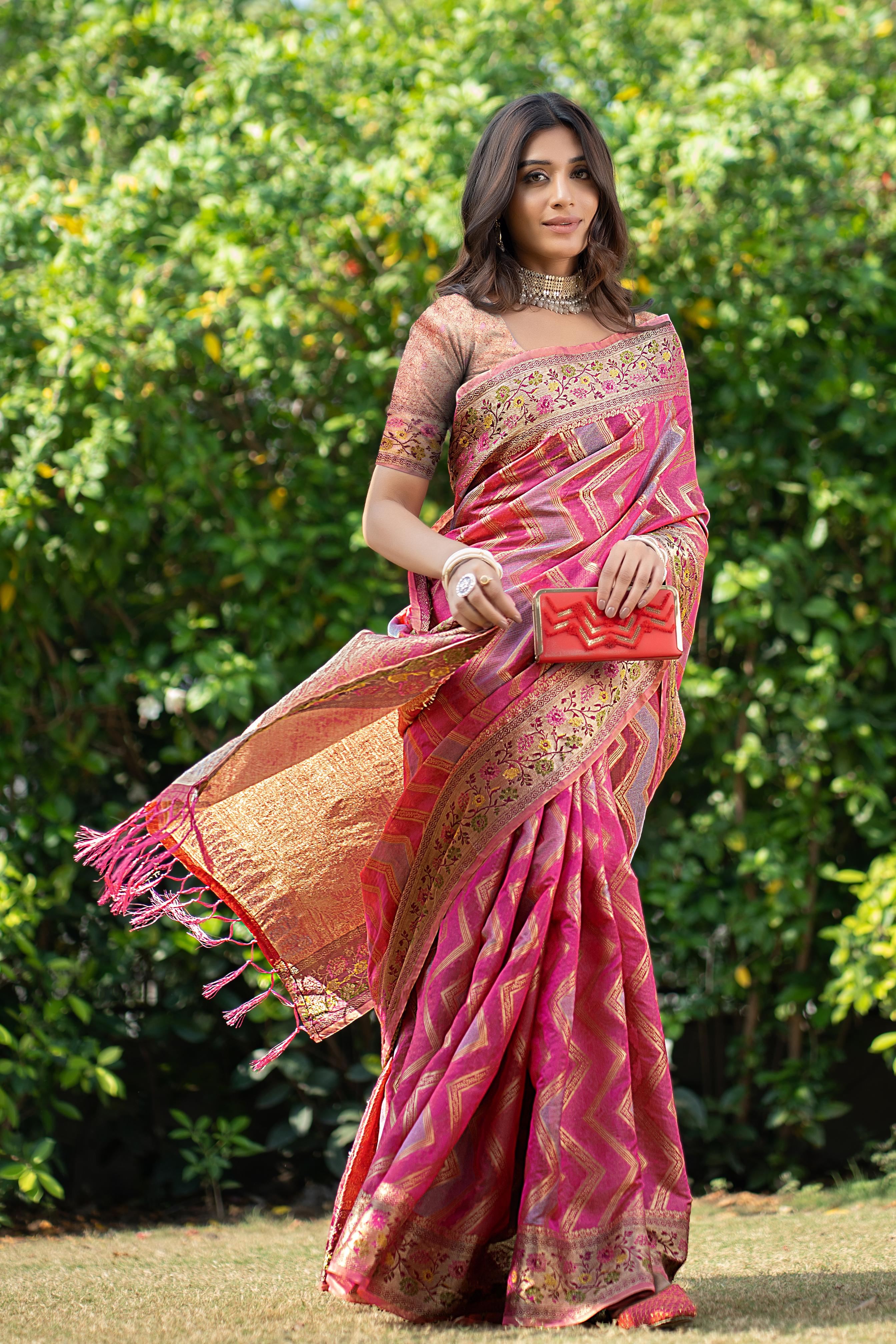 Pink organza zari woven lehriya saree