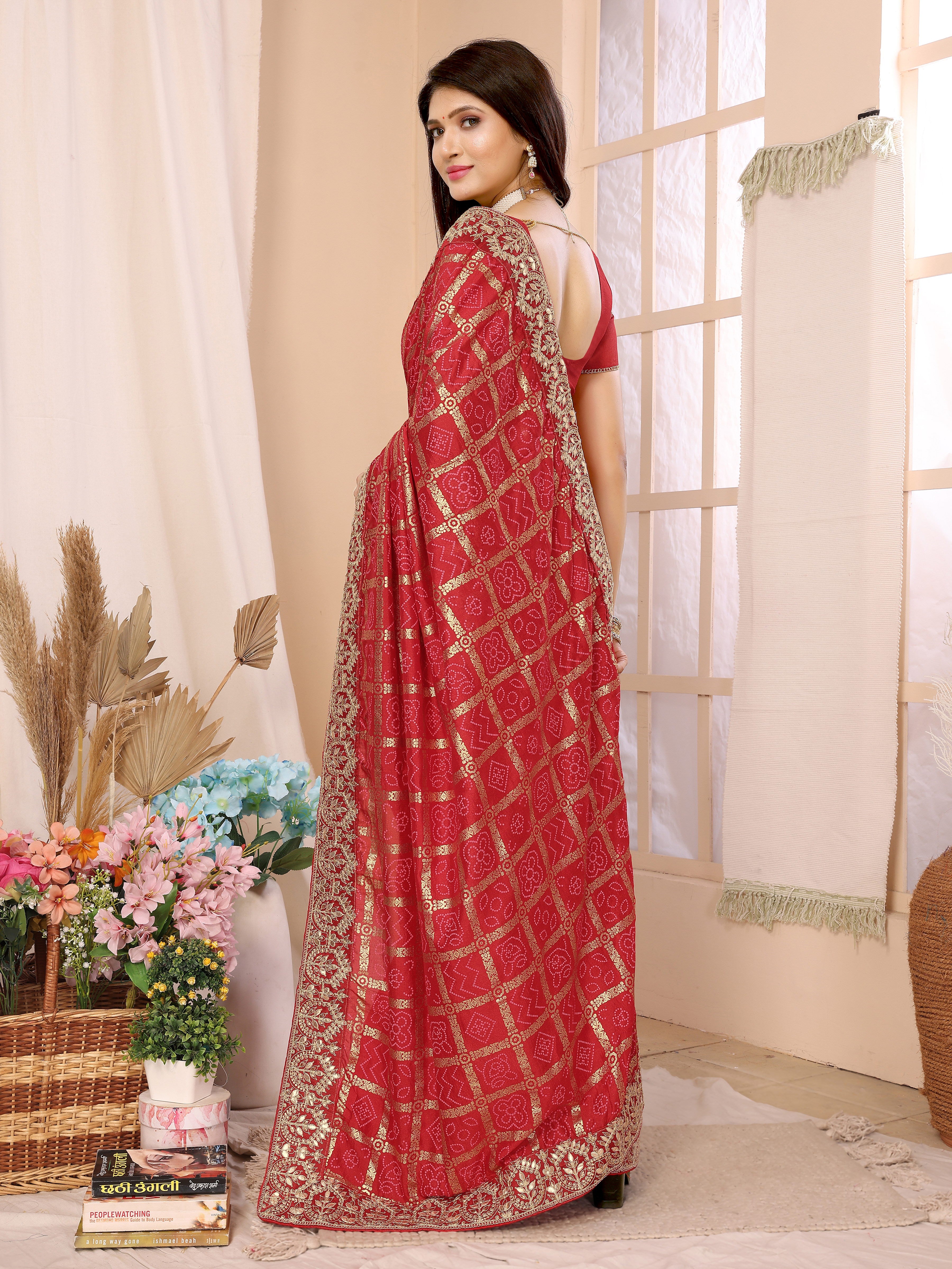 Red bandhani saree for wedding guest