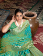 Green Banarasi silk blend saree with zari woven border