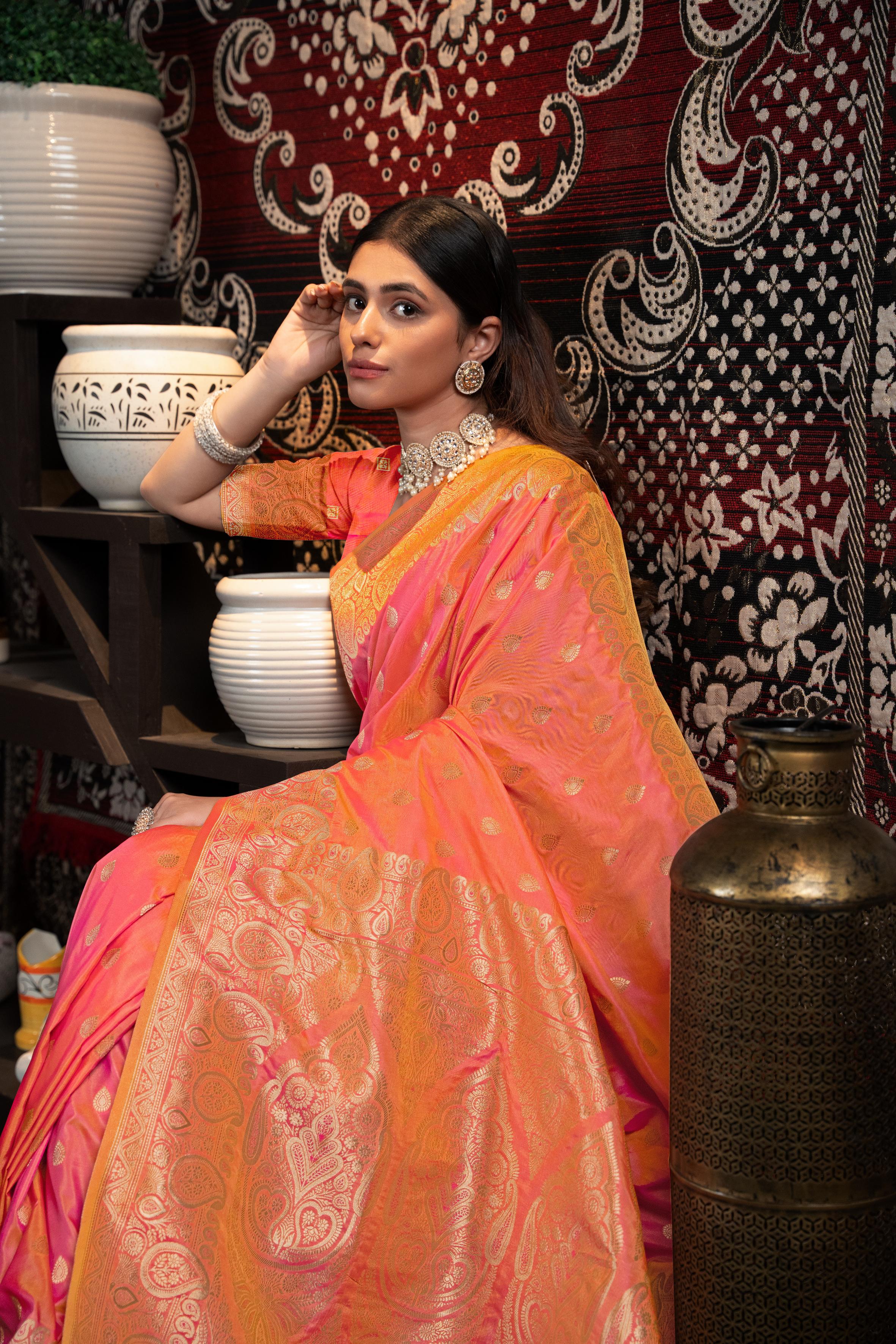 Peach Banarasi silk blend saree with zari woven border