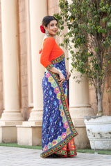 Orange and Blue Georgette Half And Half Bandhej Print Saree