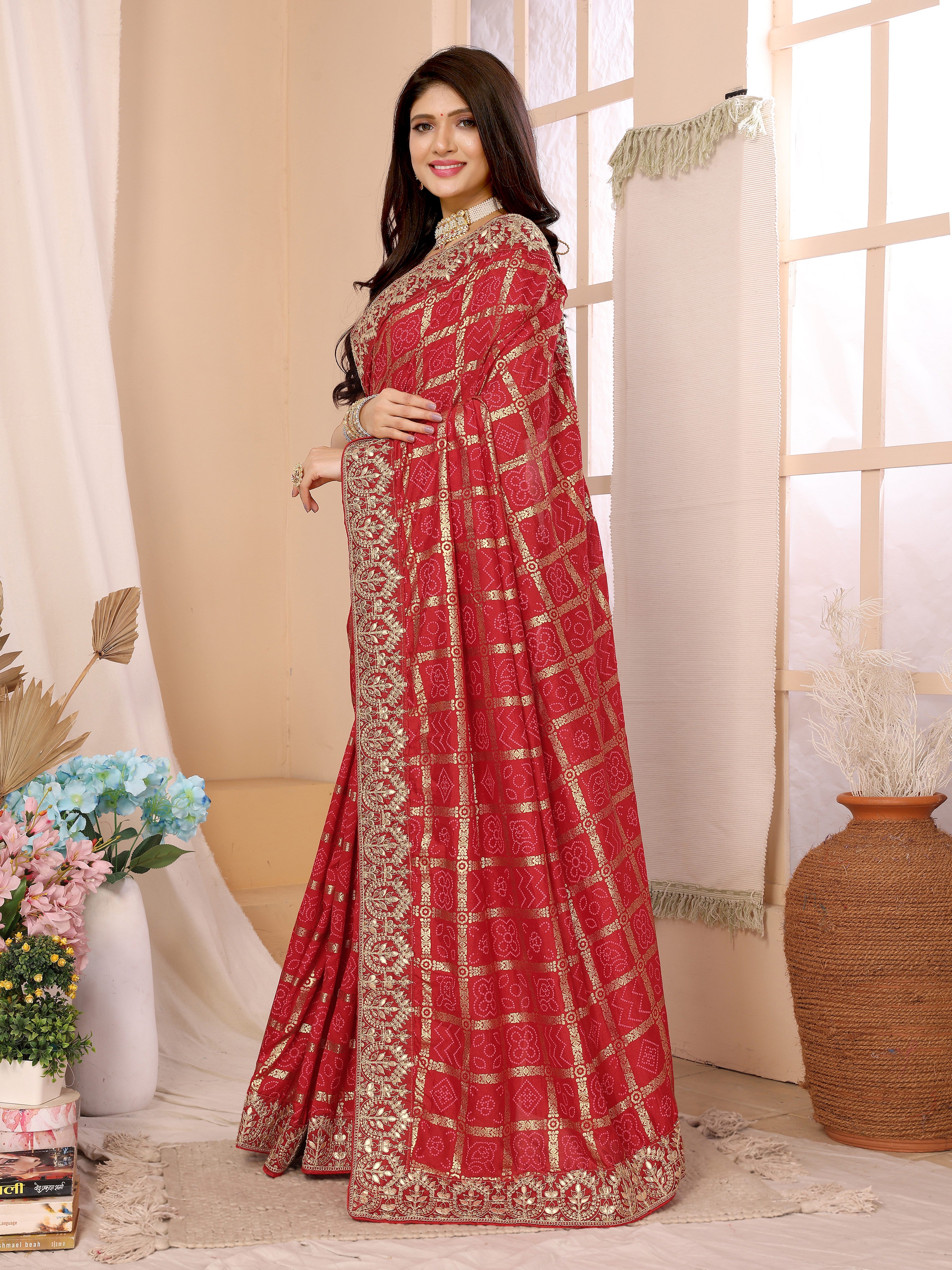 Traditional red bandhani saree with zari work