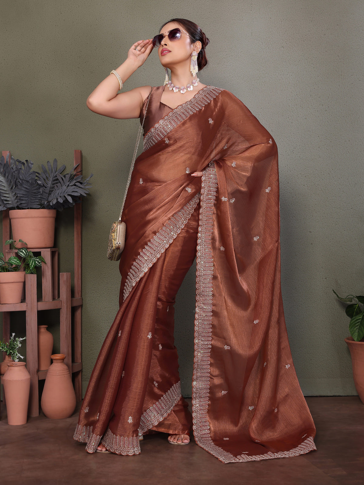 Brown Jimmy choo silk fabric saree with zari work