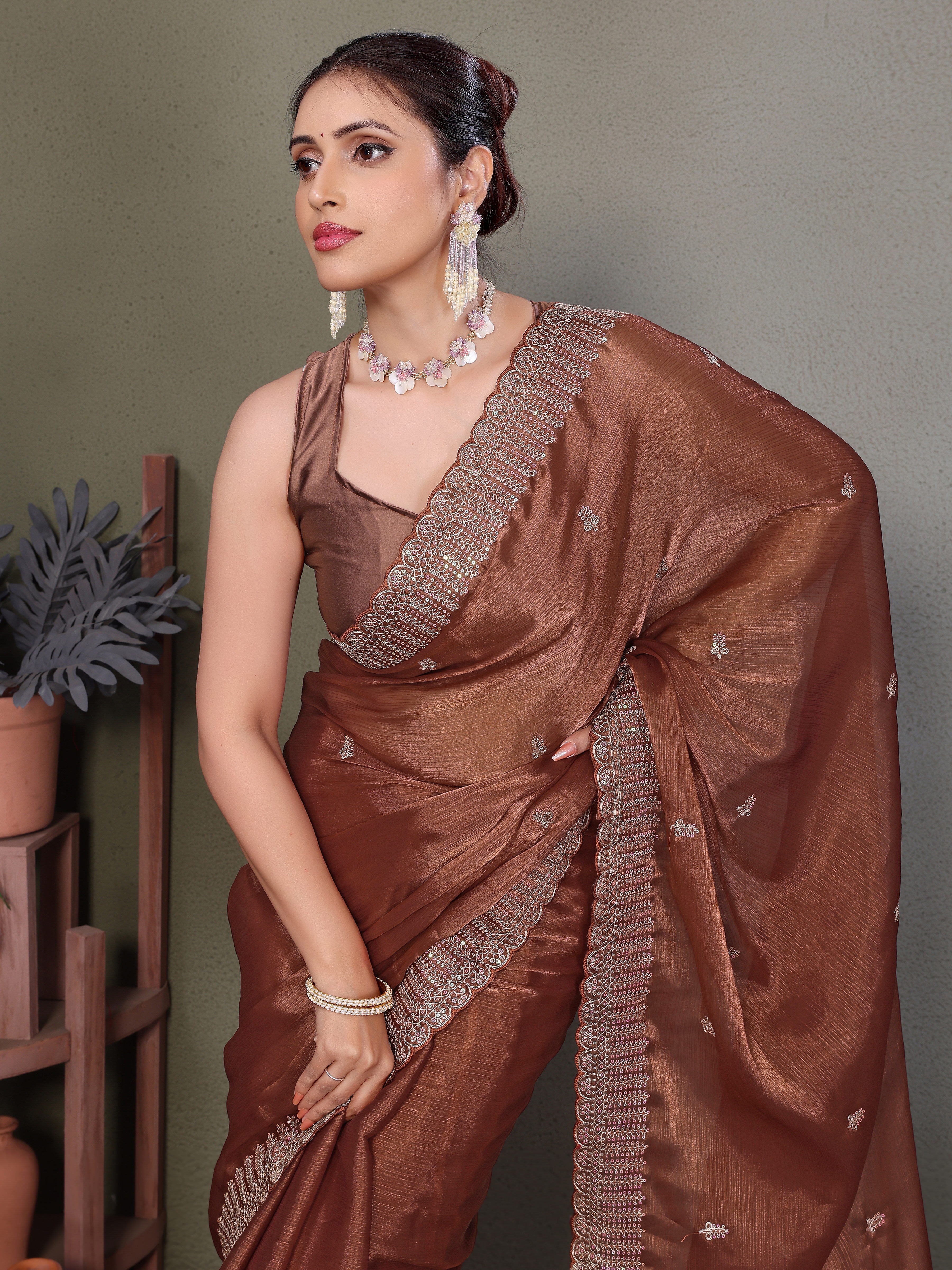 Brown Jimmy choo silk fabric saree with zari work