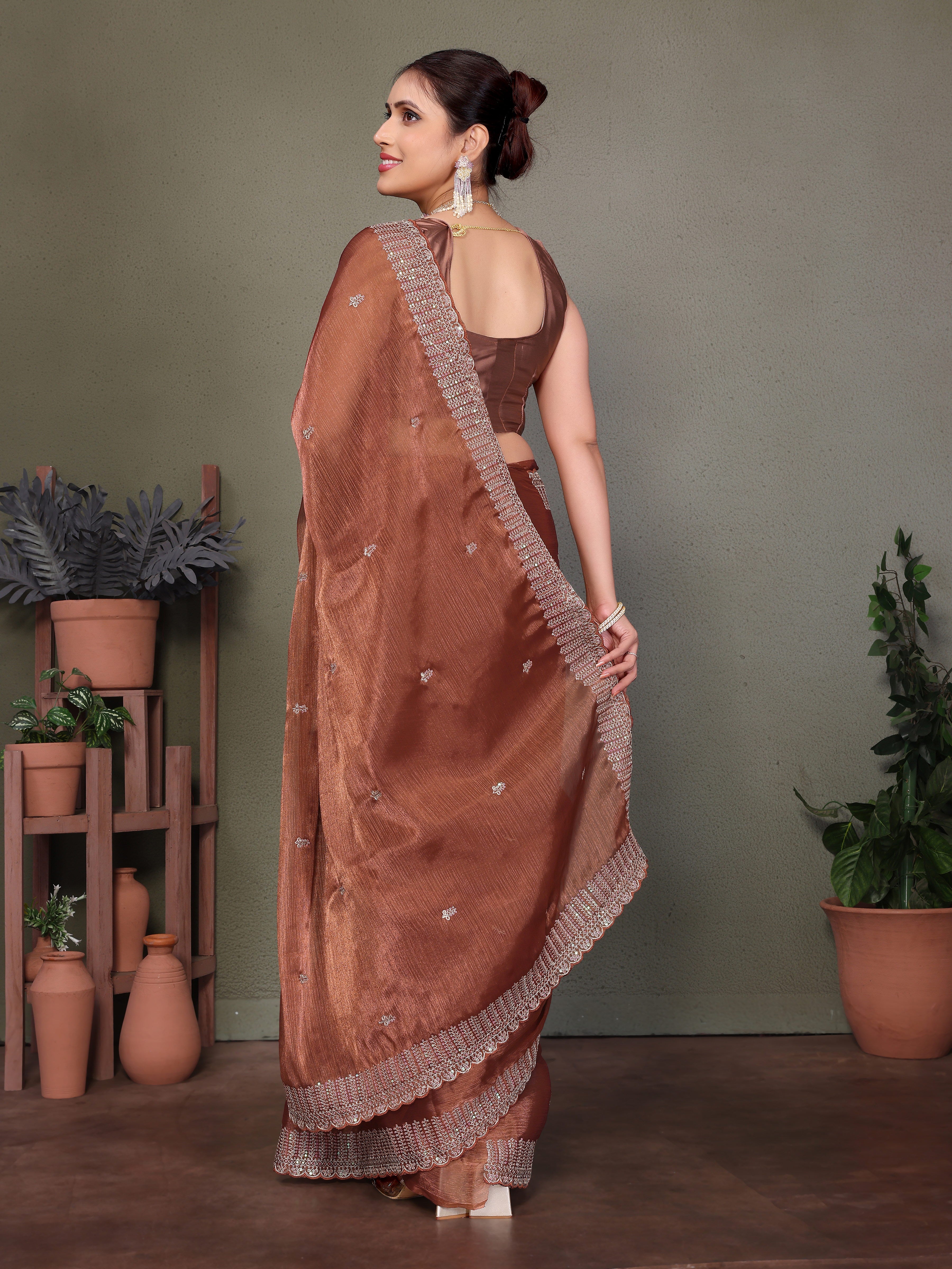 Brown Jimmy choo silk fabric saree with zari work