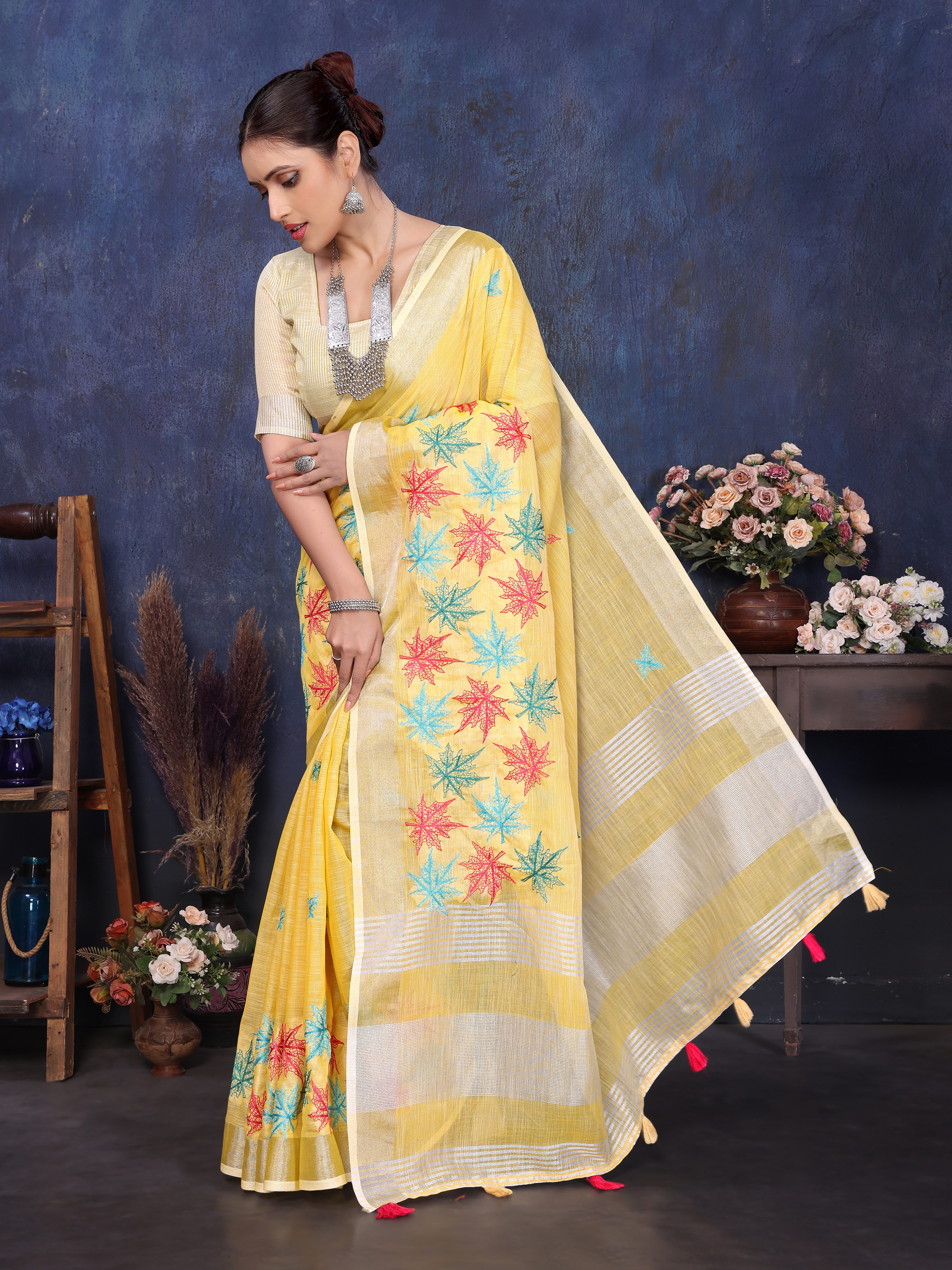 Yellow linen saree with embroidery work