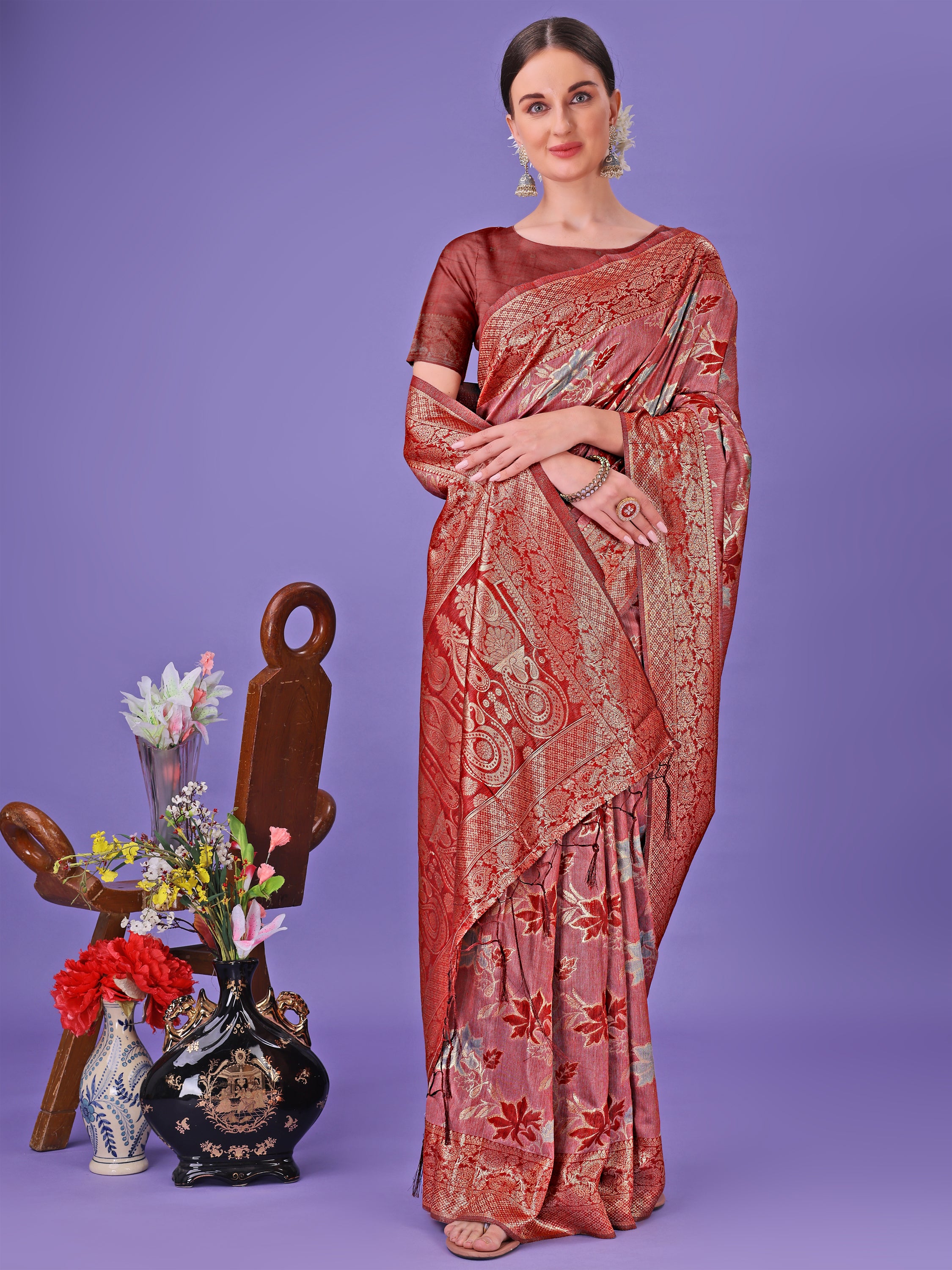 Model wearing red traditional cotton saree
