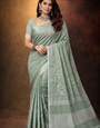 Teal Green linen saree with floral design