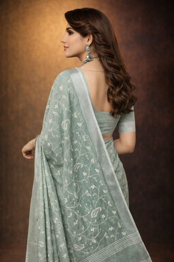Teal Green linen saree with floral design