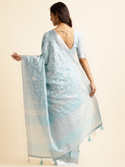 sky blue linen saree with bold floral work 
